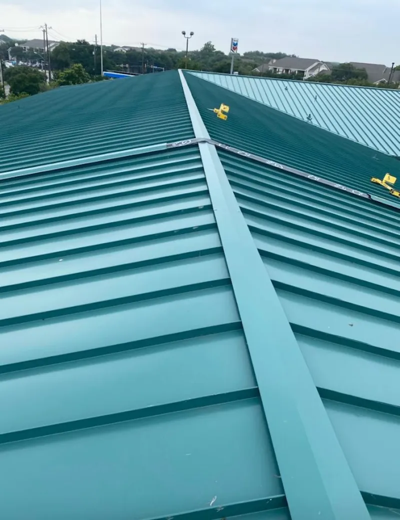Green commercial metal roof ridge and valley for Metal Roof Repair in Los Banos
